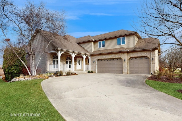 view of front facade featuring a garage, a front lawn, and a porch