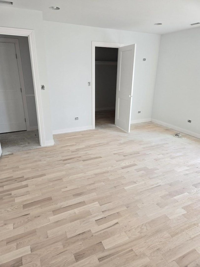 empty room featuring light hardwood / wood-style floors