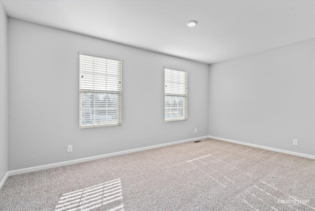 view of carpeted spare room