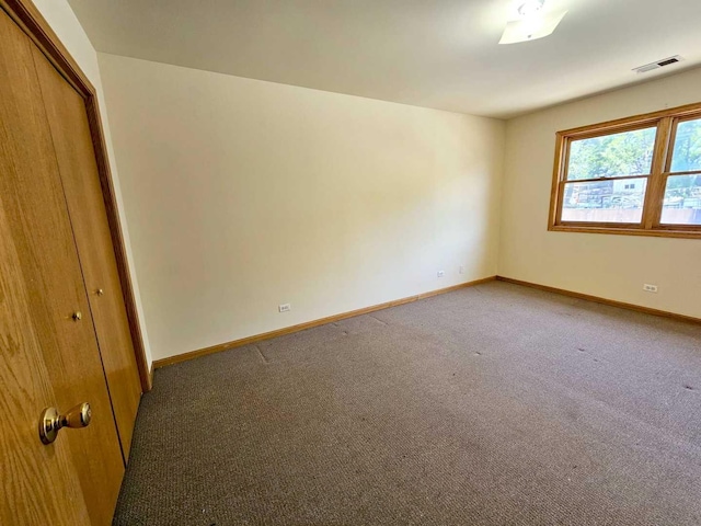 empty room featuring carpet