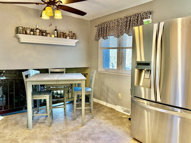 dining area with ceiling fan