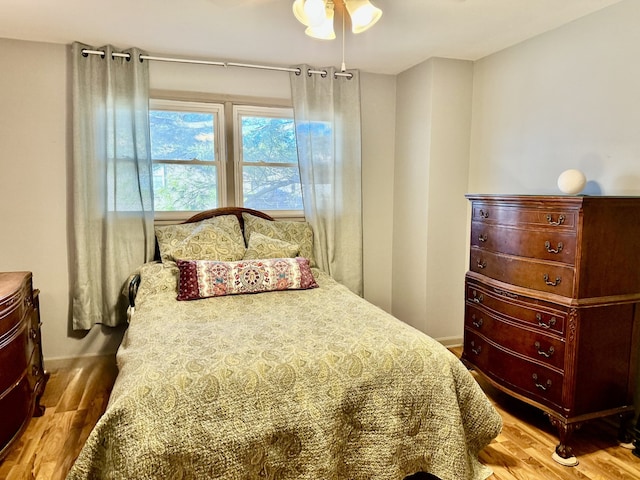 bedroom with light hardwood / wood-style flooring