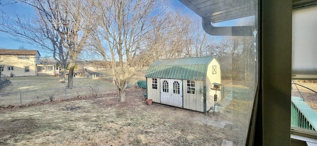 view of yard with a storage shed