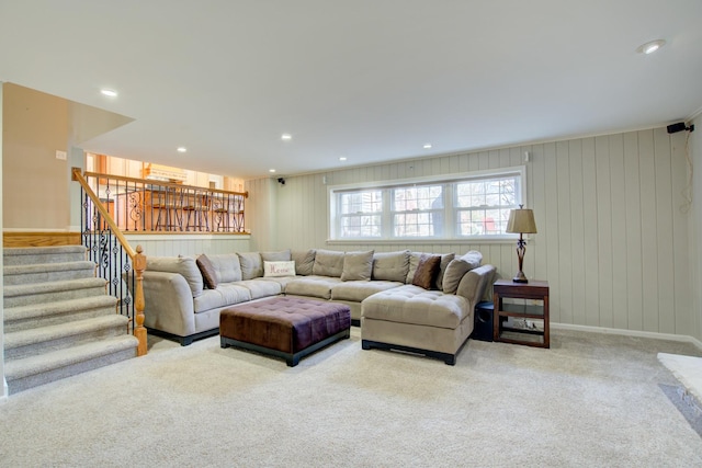 living room featuring stairway, carpet flooring, recessed lighting, and baseboards