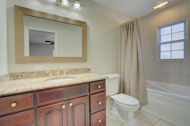 bathroom with tile patterned floors, shower / bath combo with shower curtain, toilet, and vanity