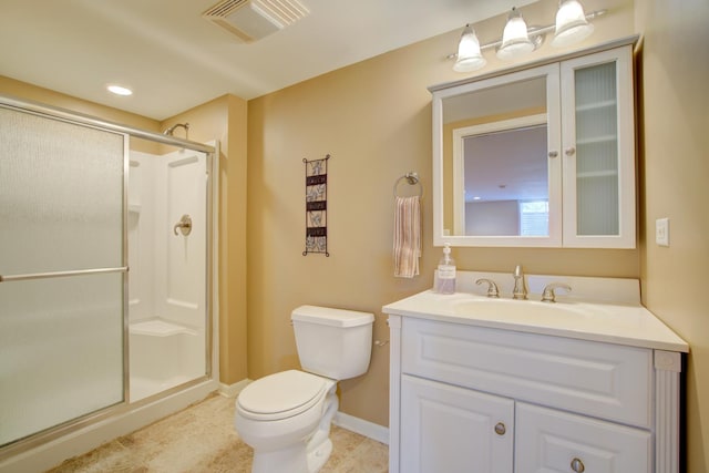 full bath with vanity, visible vents, tile patterned flooring, a shower stall, and toilet