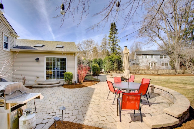 view of patio featuring outdoor dining area