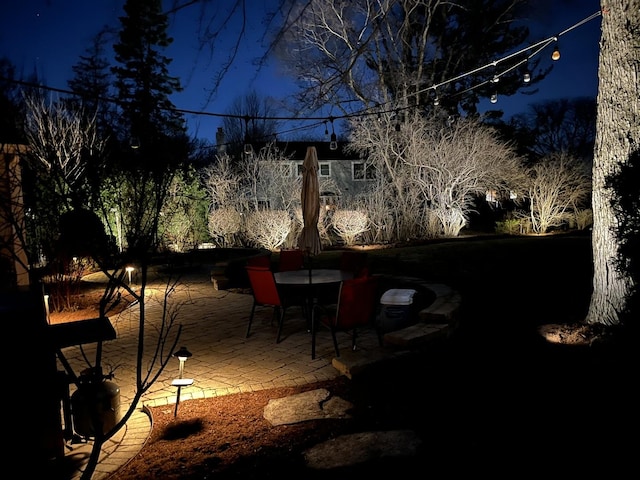 view of patio at twilight