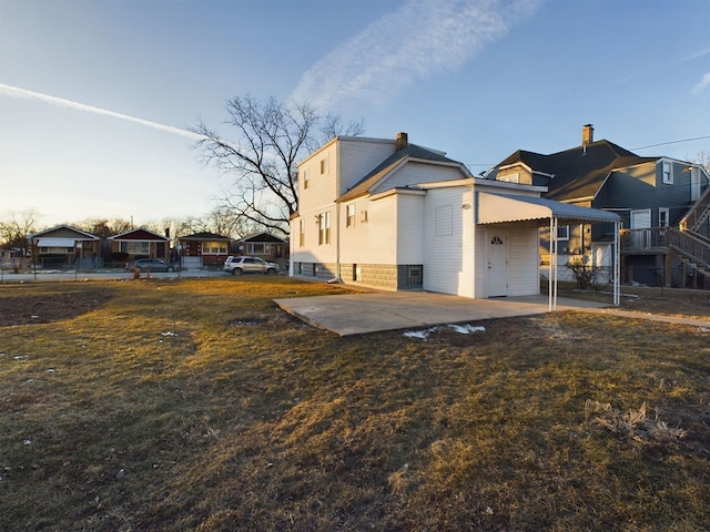 exterior space with a yard and a patio