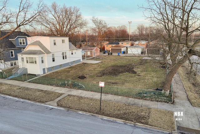 birds eye view of property with a residential view