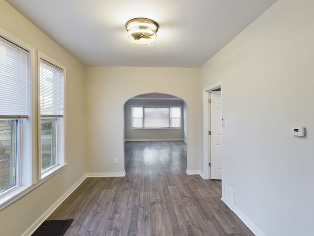 corridor featuring hardwood / wood-style floors