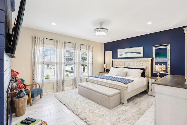 bedroom featuring light tile patterned flooring