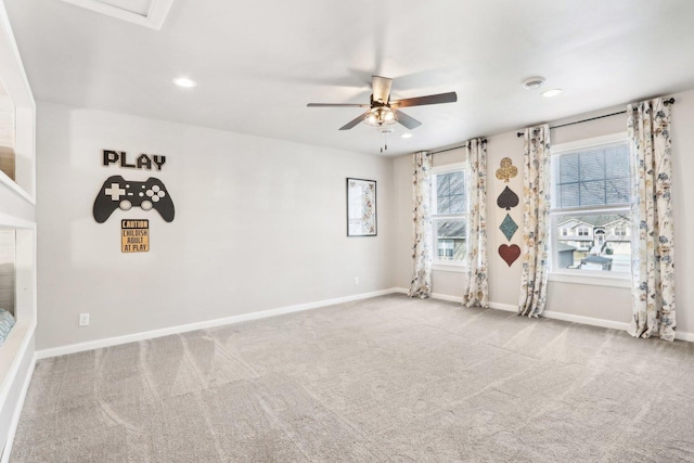 empty room with recessed lighting, carpet flooring, ceiling fan, and baseboards