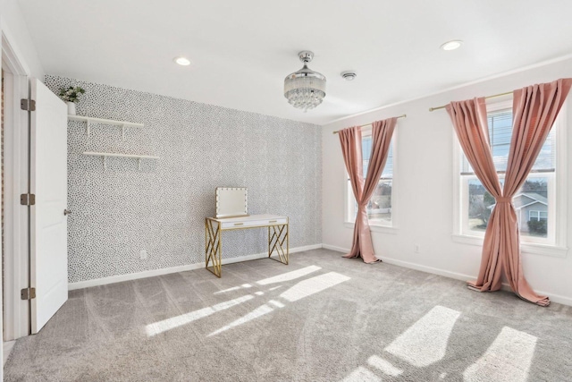 interior space featuring carpet, recessed lighting, baseboards, and wallpapered walls