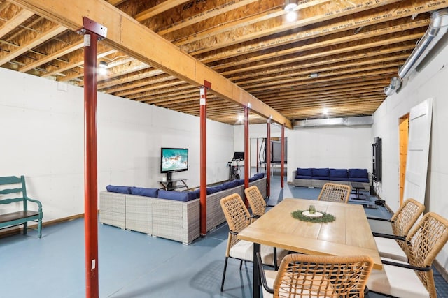 dining space with concrete flooring