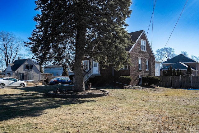 view of front of house with a front lawn