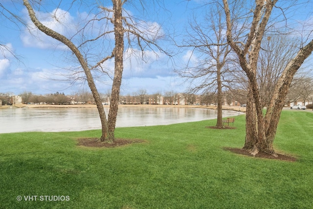 view of yard with a water view