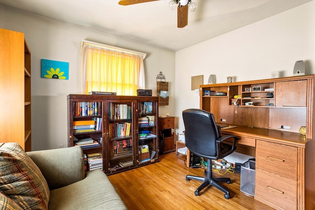 office area featuring light hardwood / wood-style flooring and ceiling fan