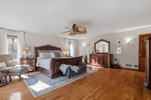 bedroom featuring light hardwood / wood-style flooring and ceiling fan