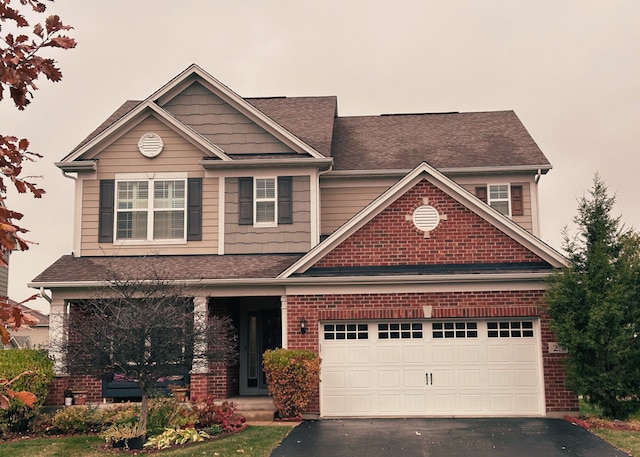 craftsman inspired home with a garage