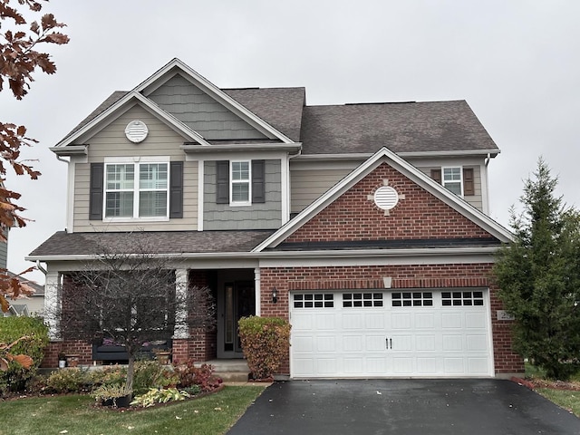 craftsman-style home with a garage