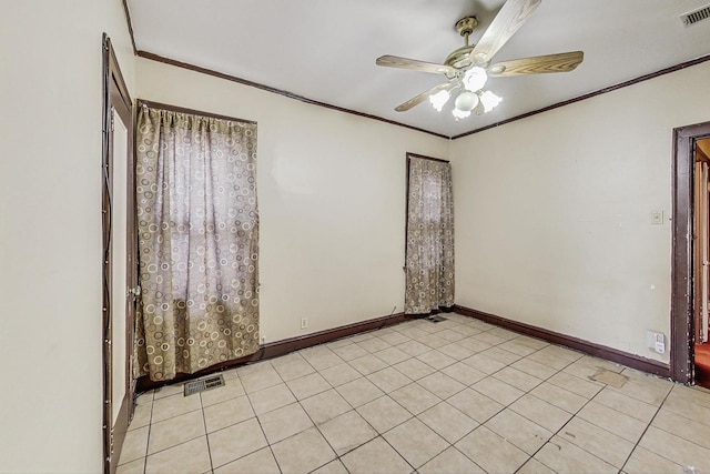 tiled empty room featuring crown molding and ceiling fan