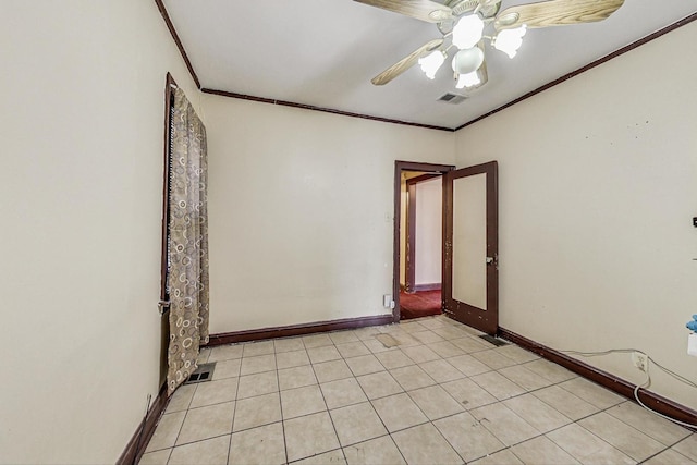 tiled empty room with ornamental molding and ceiling fan