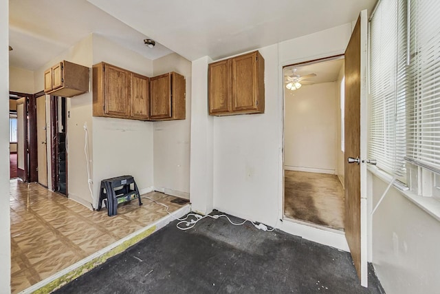 kitchen featuring ceiling fan