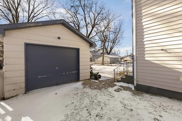 view of snow covered garage