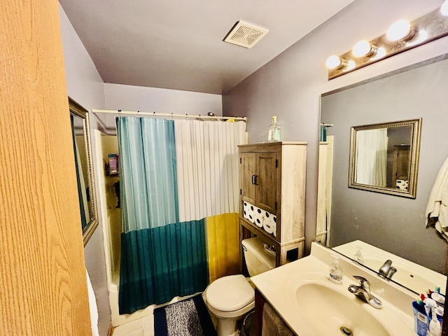 full bathroom with vanity, shower / bath combination with curtain, and toilet