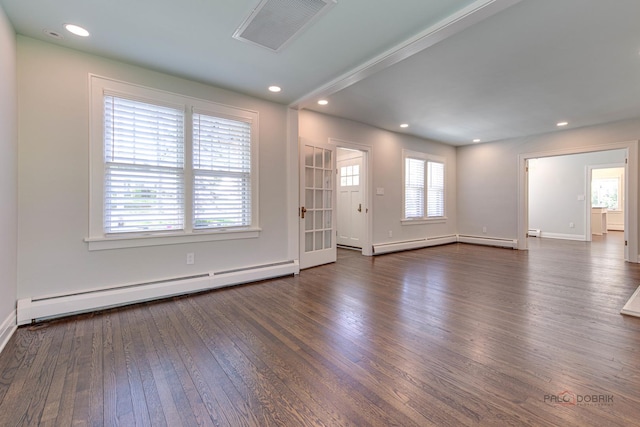 interior space with a baseboard radiator and dark hardwood / wood-style floors