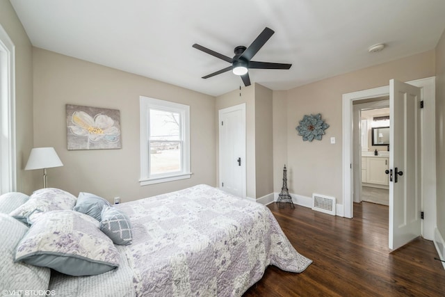 bedroom with dark wood-type flooring and ceiling fan