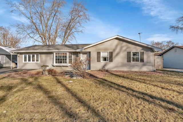 ranch-style house with a front yard