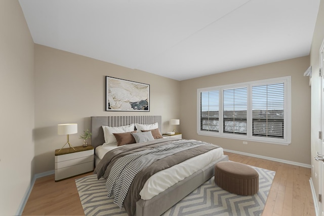 bedroom with light hardwood / wood-style floors