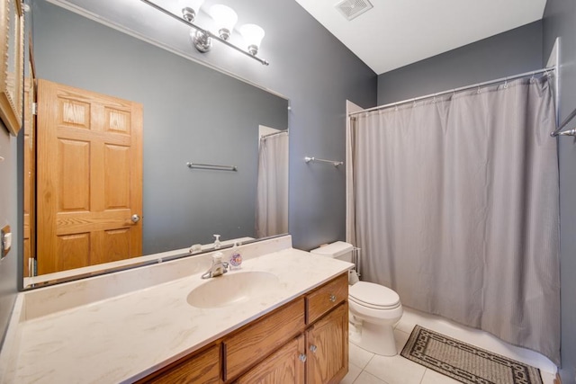 bathroom with a shower with curtain, vanity, tile patterned floors, and toilet