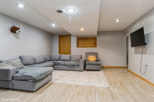 living room featuring wood-type flooring