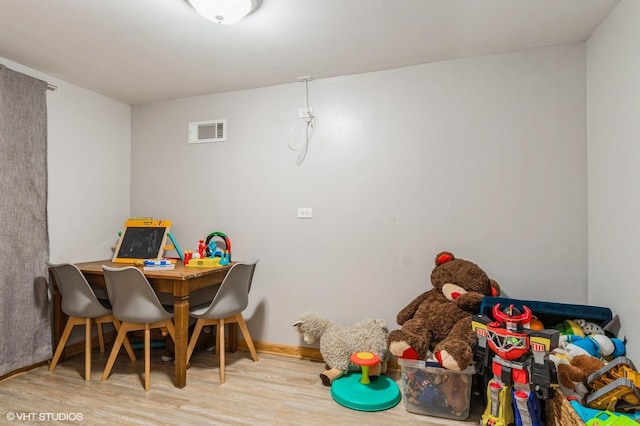 rec room featuring light hardwood / wood-style flooring