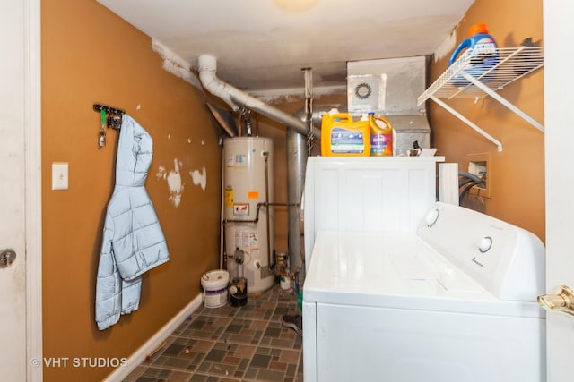 washroom featuring gas water heater and washing machine and clothes dryer