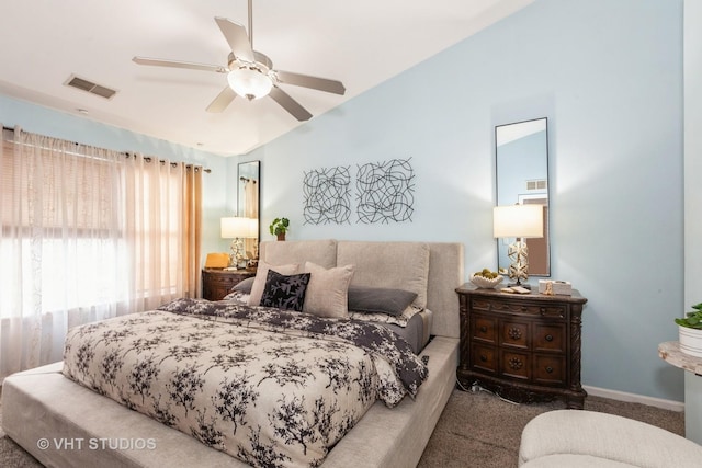 bedroom with ceiling fan and carpet flooring