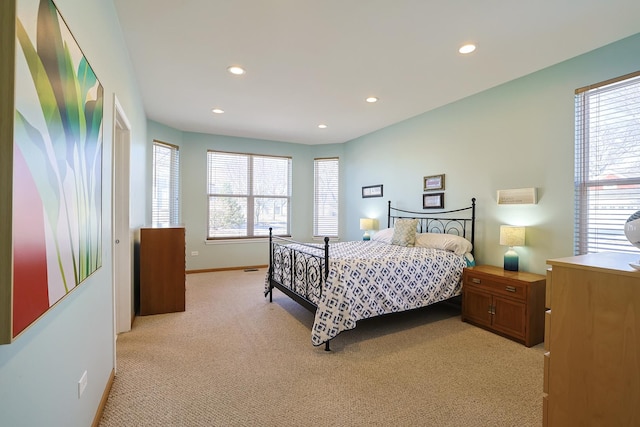 bedroom with light carpet