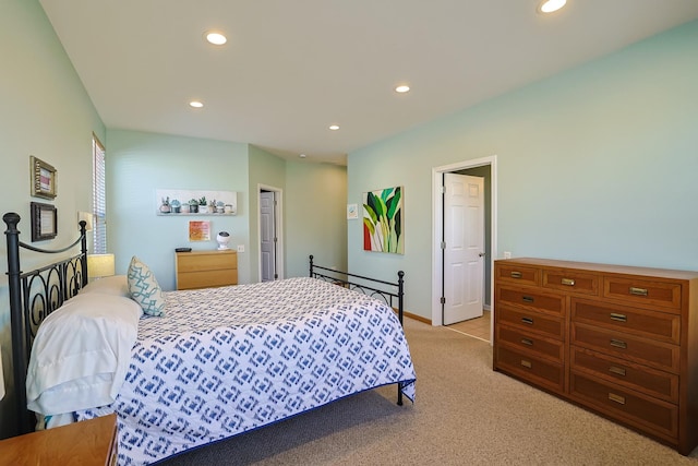 bedroom with light colored carpet