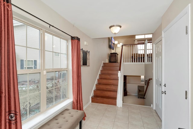 view of tiled entrance foyer