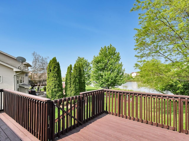 wooden terrace with a water view