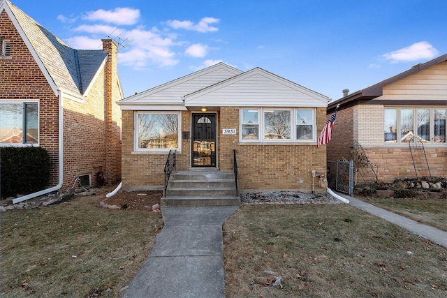 bungalow with a front lawn