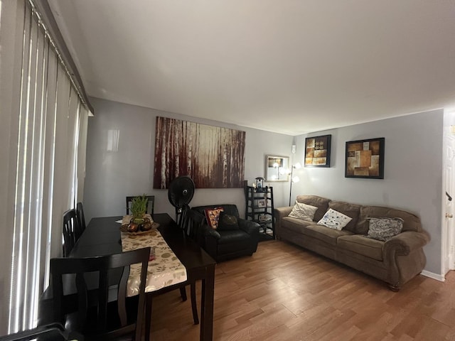 living room with light hardwood / wood-style flooring