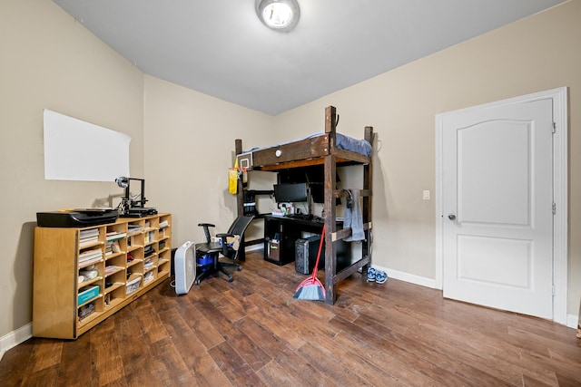 bedroom featuring dark wood-type flooring