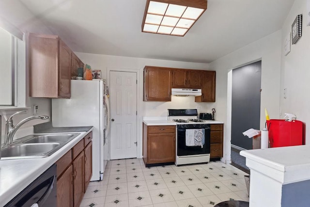 kitchen with black dishwasher, range with gas stovetop, and sink