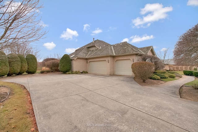 view of side of property featuring a garage