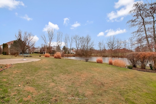 view of yard with a water view