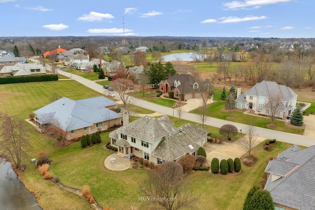 drone / aerial view with a water view